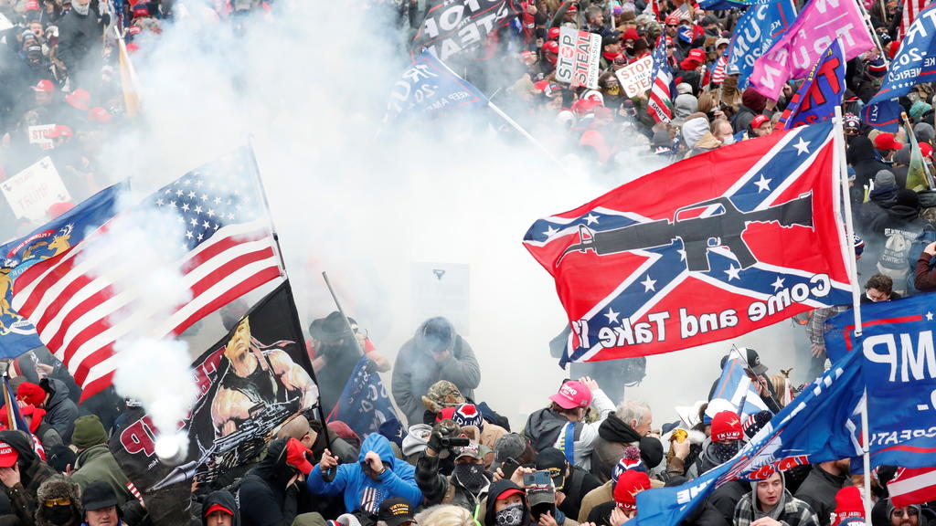 Tear gas is released into a crowd of protesters during clashes with Capitol police at a rally to contest the certification of the 2020 U.S. presidential election results by the U.S. Congress, at the U.S. Capitol Building in Washington, U.S, January 6