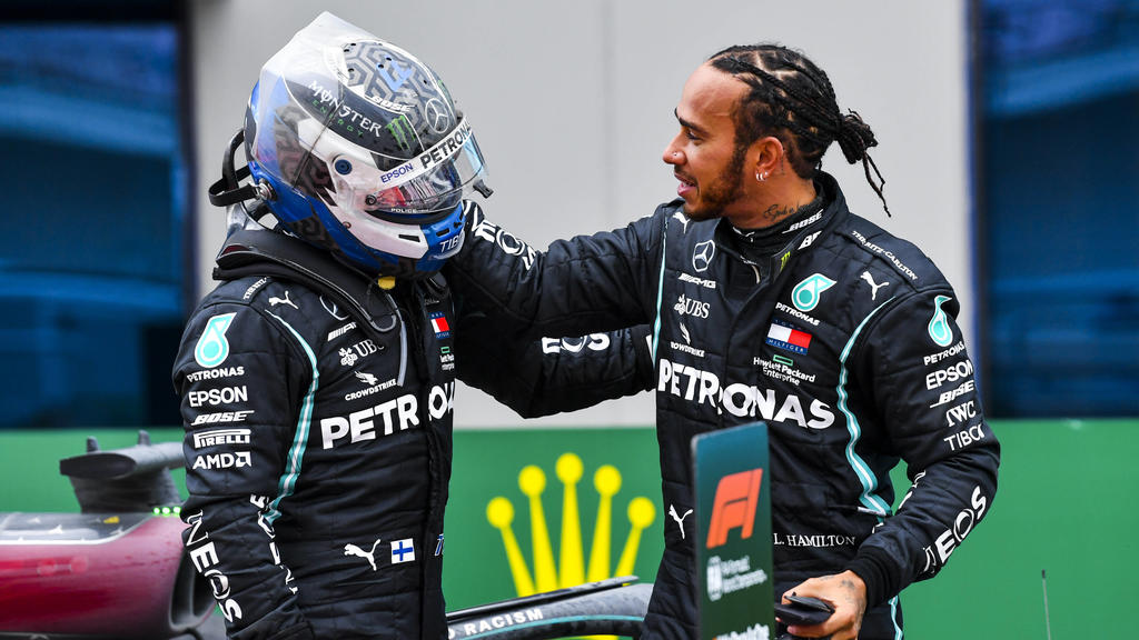 2020 Turkish GP ISTANBUL PARK, TURKEY - NOVEMBER 15: Race Winner Lewis Hamilton, Mercedes-AMG Petronas F1 celebrates his 7th World Championship, WM, Weltmeisterschaft title in Parc Ferme with Valtteri Bottas, Mercedes-AMG Petronas F1 during the Turki