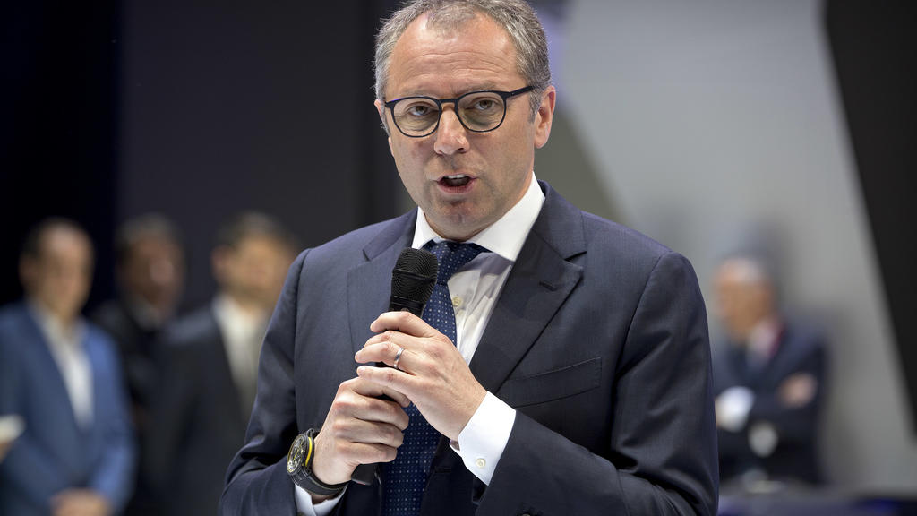 FILE- In this April 25, 2018, file photo, Stefano Domenicali, CEO of Lamborghini, speaks during a press conference at the China Auto Show in Beijing. Domenicali is replacing Chase Carey as president and CEO of Formula One from next year, F1 also anno