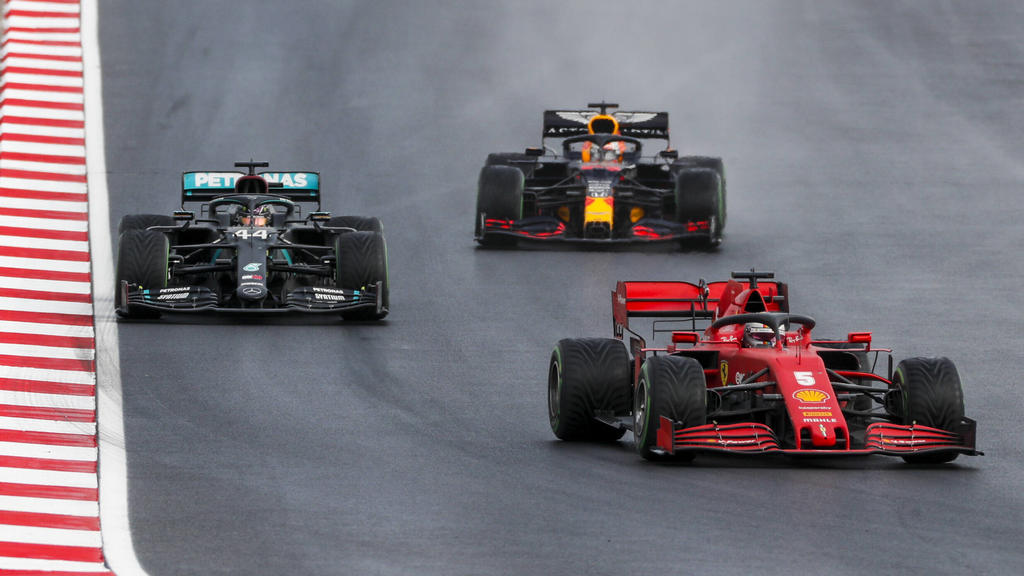 2020 Turkish GP ISTANBUL PARK, TURKEY - NOVEMBER 15: Sebastian Vettel, Ferrari SF1000, leads Lewis Hamilton, Mercedes F1 W11 EQ Performance, and Max Verstappen, Red Bull Racing RB16 during the Turkish GP at Istanbul Park on Sunday November 15, 2020,