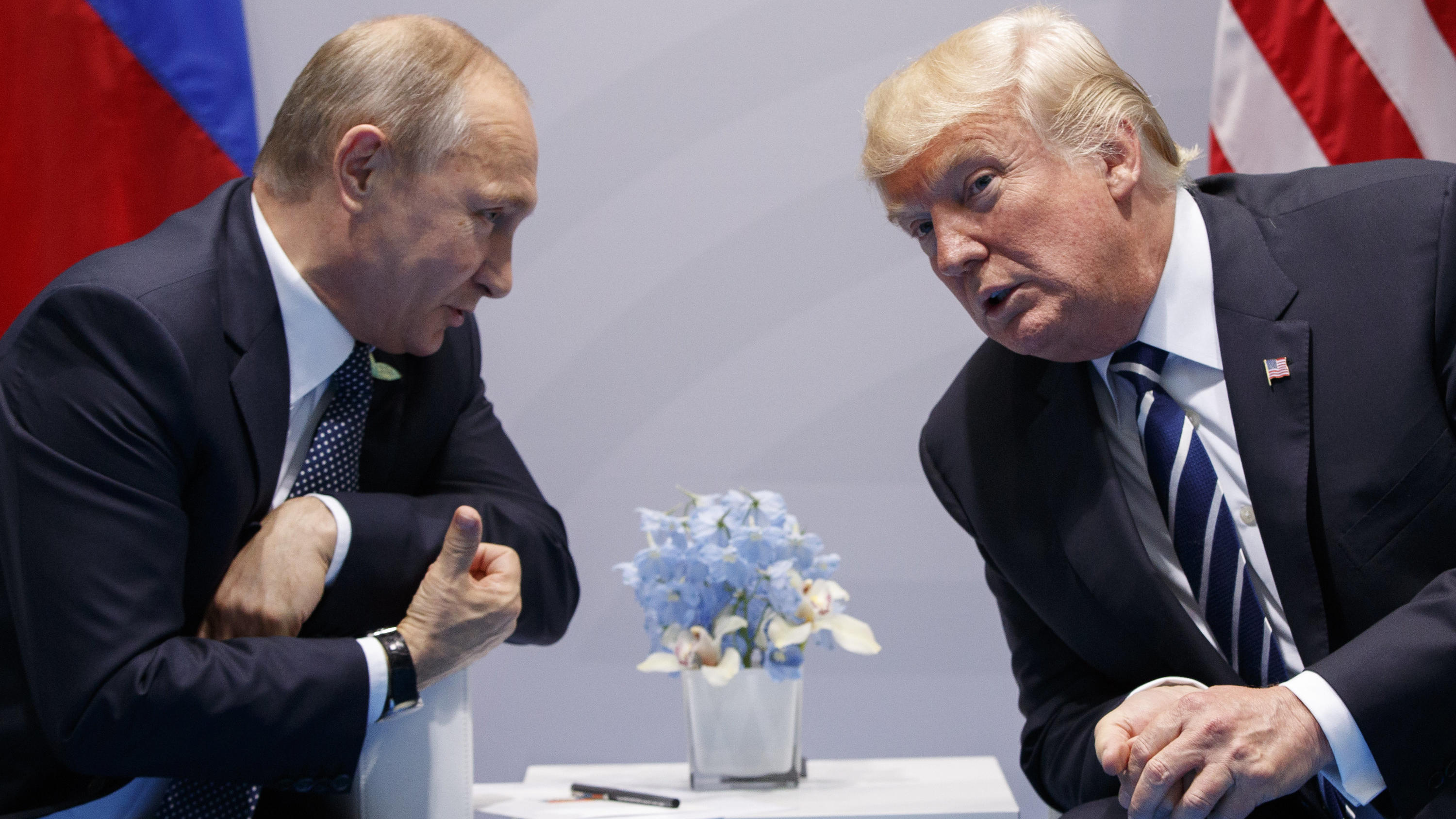 FILE - In this  July 7, 2017, file photo, U.S. President Donald Trump meets with Russian President Vladimir Putin at the G-20 Summit in Hamburg. Putin wonâ€™t congratulate President-elect Joe Biden until legal challenges to the U.S. election are reso
