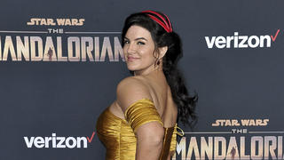 FILE - In this Wednesday, Nov. 13, 2019, file photo, Gina Carano attends the LA premiere of "The Mandalorian" at the El Capitan Theatre in Los Angeles. In a statement Wednesday, Feb. 10, 2021, Lucasfilm said Carano is no longer a part of â€œThe Mandalorianâ€ cast after many online called for her firing over a social media post that likened the experience of Jews during the Holocaust to the U.S. political climate. (Photo by Richard Shotwell/Invision/AP, File)