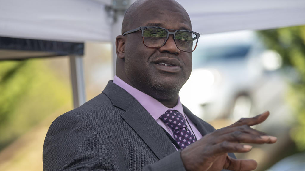 Basketball Hall of Famer Shaquille O'Neal speaks at a press conference in McDonough, Ga., Friday, Jan. 22, 2021, after being named Henry County Sheriff's Office Director of Community Relations by Henry County Sheriff Reginald Scandrett. (Alyssa Poin