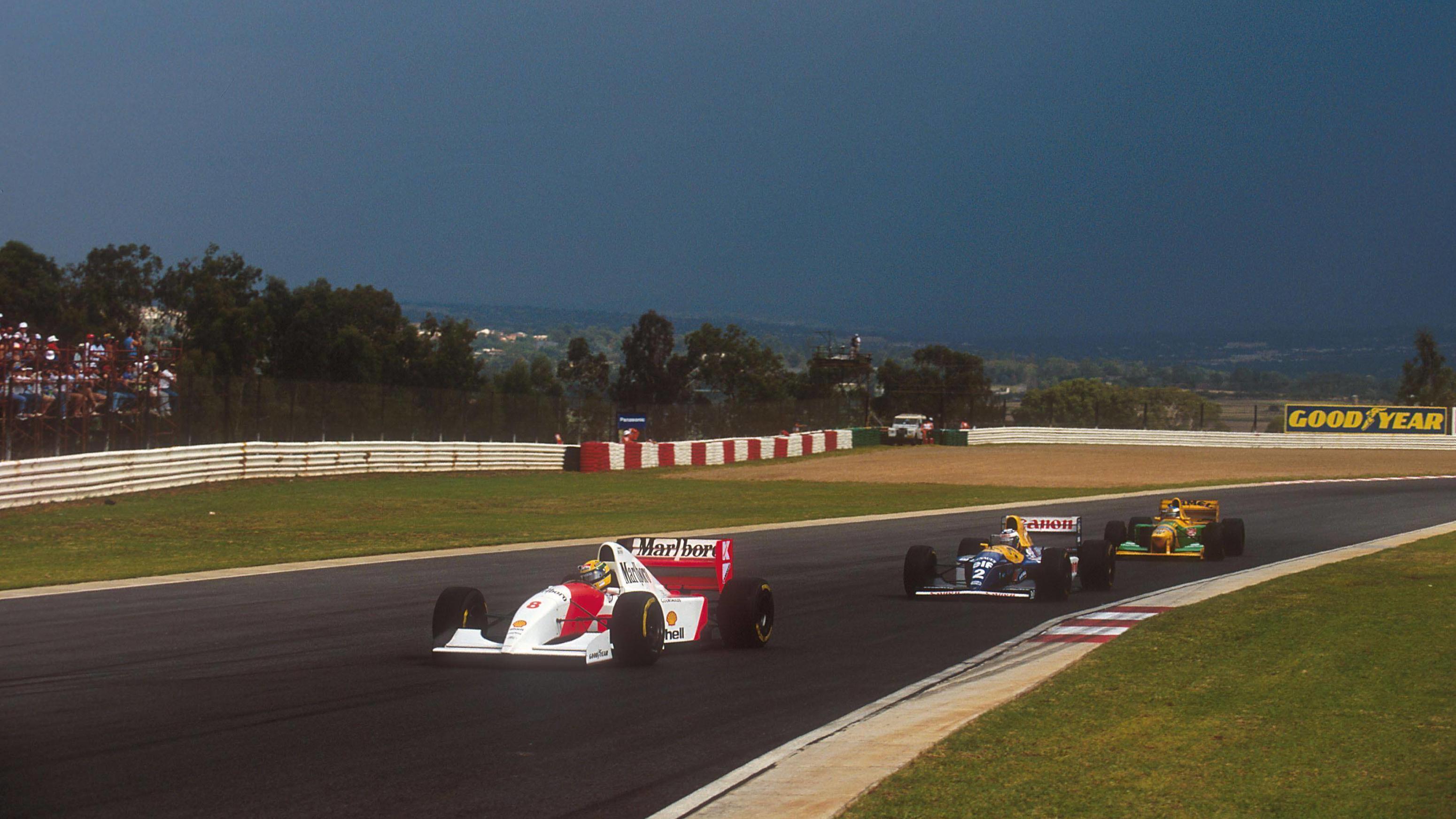  1993 South African Grand Prix. Kyalami, South Africa. 12-14 March 1993. Ayrton Senna McLaren MP4/8 Ford leads Alain Prost Williams FW15C Renault and Michael Schumacher Benetton B192B Ford. Ref-93 SA 01. World Copyright - LAT Photographic ACHTUNG AUF