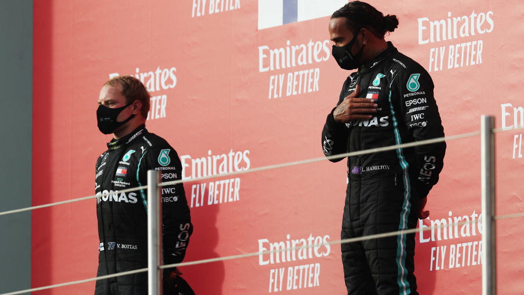 2020 Emilia-Romagna GP IMOLA, ITALY - NOVEMBER 01: Valtteri Bottas, Mercedes-AMG Petronas F1, 2nd position, and Lewis Hamilton, Mercedes-AMG Petronas F1, 1st position, on the podium during the Emilia-Romagna GP at Imola on Sunday November 01, 2020,