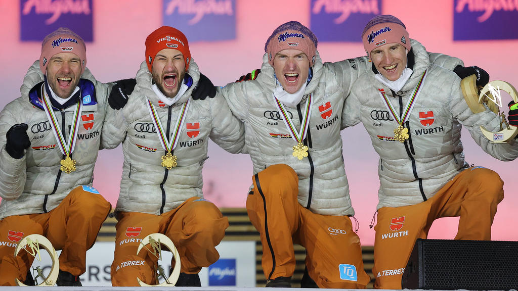 NORDIC SKIING - FIS Nordic World Ski Championships Oberstdorf 2021 OBERSTDORF,GERMANY,06.MAR.21 - NORDIC SKIING, Ski jumping, Skispringen, Ski, nordisch - FIS Nordic World Ski Championships, team event, large hill, men, award ceremony. Image shows t