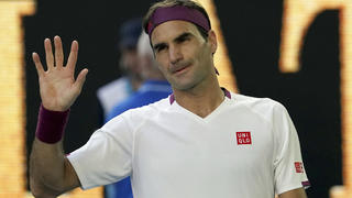 FILE- In this Jan. 28, 2020, file photo, Switzerland's Roger Federer waves after defeating Tennys Sandgren, of the United States, in their quarterfinal match at the Australian Open tennis championship in Melbourne, Australia. Federer is back on tour after more than a year away. (AP Photo/Lee Jin-man, File)