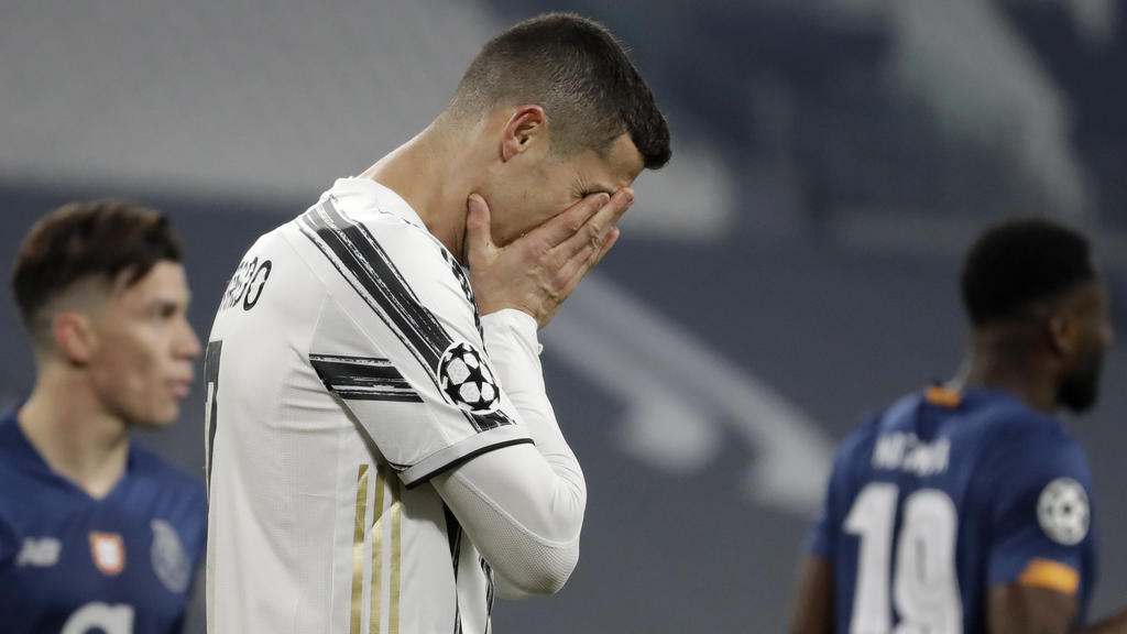 FILE - In this Tuesday, March 9, 2021 file photo Juventus' Cristiano Ronaldo reacts during the Champions League, round of 16, second leg, soccer match between Juventus and Porto in Turin, Italy. Neither Lionel Messi nor Cristiano Ronaldo will be in t