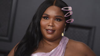 Lizzo poses in the press room at the 63rd annual Grammy Awards at the Los Angeles Convention Center on Sunday, March 14, 2021. (Photo by Jordan Strauss/Invision/AP)