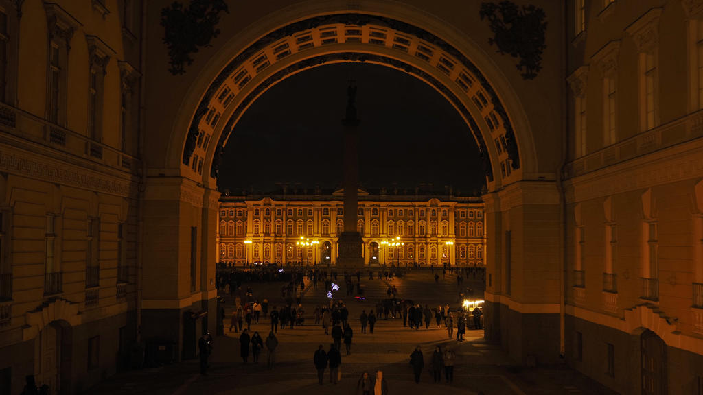The Winter Palace and the Arch of the General Staff are in darkness when the lights are turned out, marking Earth Hour in St. Petersburg, Russia, on Saturday, March, 27, 2021. Earth Hour is marked around the world, with millions expected turn out the