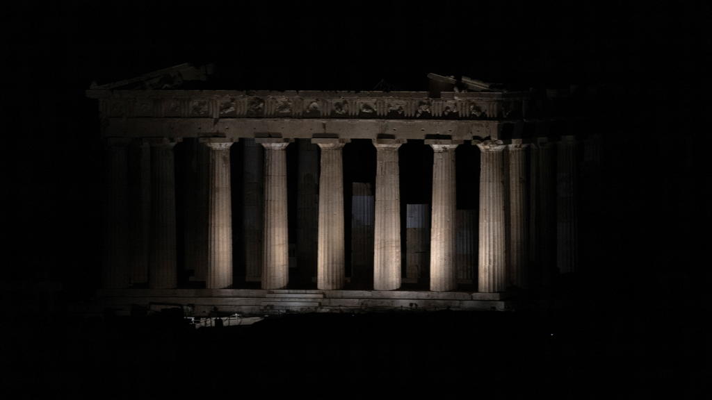 The ancient Parthenon is pictured just before the lights on the Acropolis hill shut down for Earth Hour in Athens, Greece March 27, 2021. REUTERS/Alkis Konstantinidis