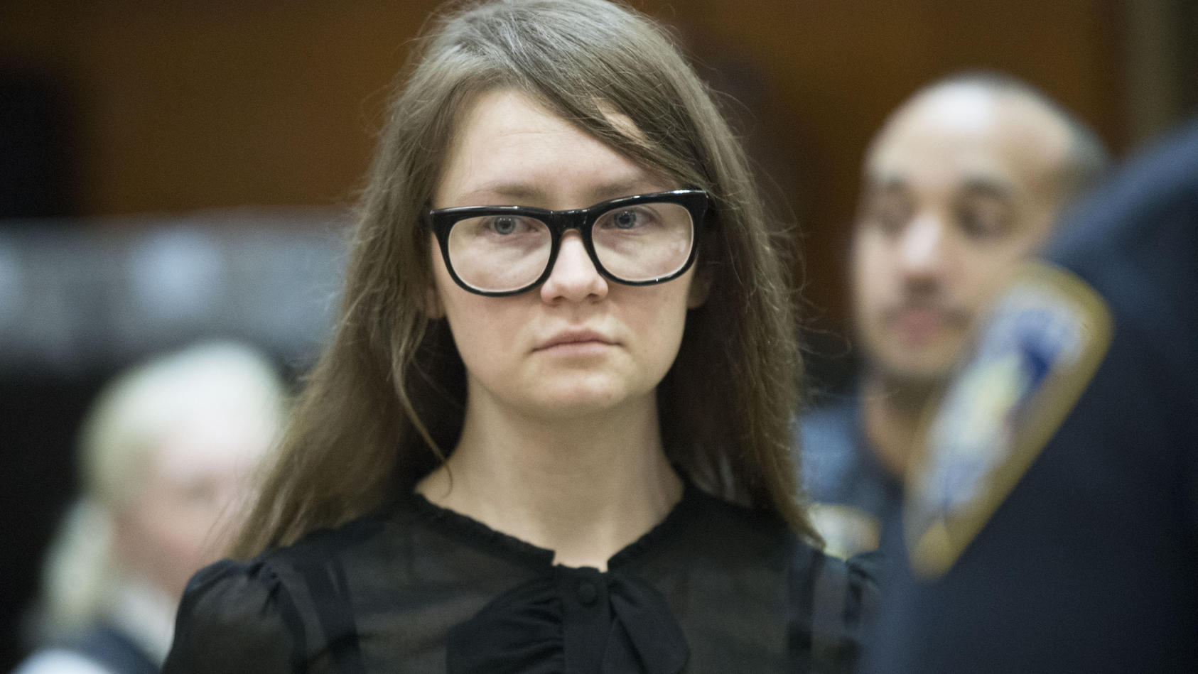 FILE - In this April 25, 2019, file photo, Anna Sorokin, who claimed to be a German heiress, returns to the courtroom during her trial on grand larceny and theft of services charges in New York.    A state website shows that Sorokin was freed into pa