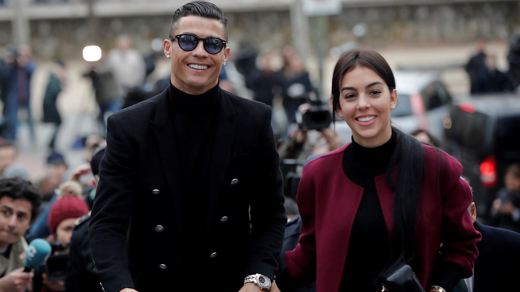 MADRID, SPAIN - JANUARY 22: Famous Portuguese football player Cristiano Ronaldo (L) leaves the provincial court with his girlfriend Georgina Rodriguez (2nd L) after his tax evasion trial in Madrid, Spain on January 22, 2019. Burak Akbulut / Anadolu A