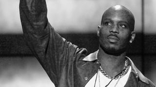 FILE PHOTO: Rapper DMX holds up his award after being named Male Entertainer of the Year at the 14th annual Soul Train Music Awards in Los Angeles, California, U.S. March 4, 2000. REUTERS/Gary Hershorn/File Photo