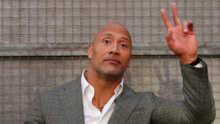 FILE PHOTO: Cast member Dwayne Johnson poses at the premiere for the movie "Rampage" in Los Angeles, California, U.S., April 4, 2018. REUTERS/Mario Anzuoni/File Photo