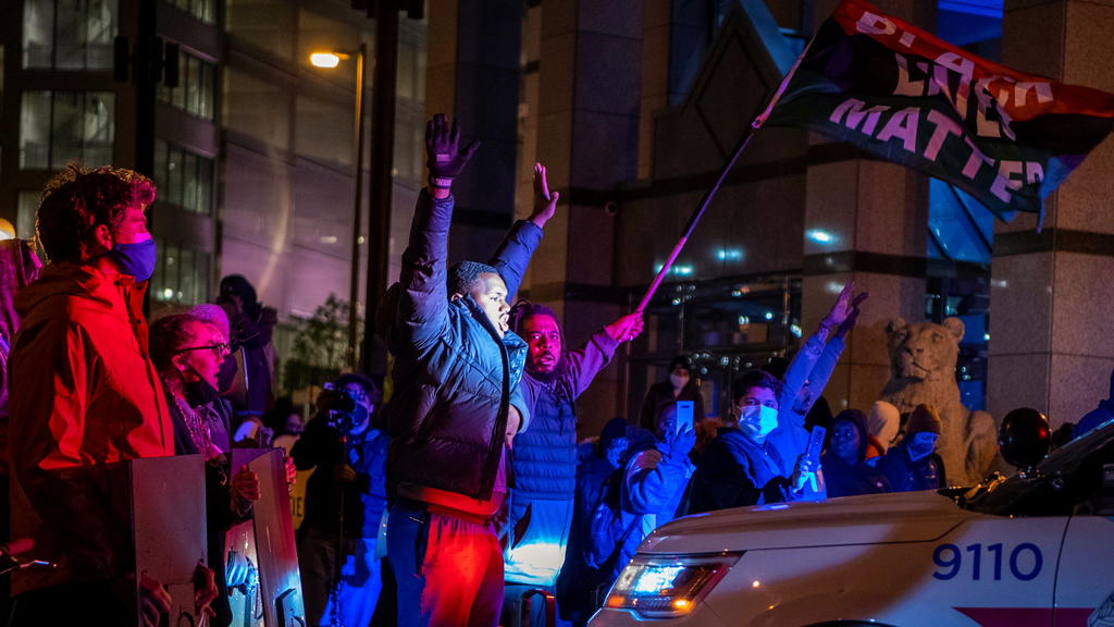 People attend a demonstration outside the Columbus Division of Police after an officer shot and killed a teenage girl in Columbus, Ohio, U.S., April 20, 2021. Picture taken April 20, 2021. REUTERS/Gaelen Morse