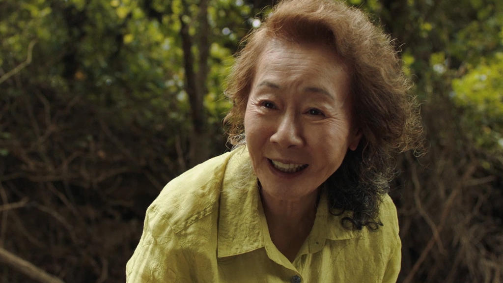 This image released by A24 shows Yuh-jung Youn in a scene from "Minari." (A24 via AP)