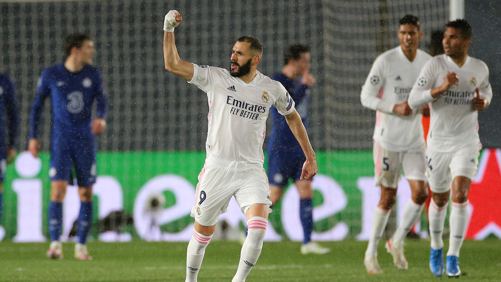27.04.2021, Spanien, Madrid: Fußball: Champions League, Real Madrid - FC Chelsea, K.o.-Runde, Halbfinale, Hinspiel im Estadio Alfredo di Stefano. Karim Benzema von Real Madrid feiert seinen ersten Treffer. Foto: Isabel Infantes/PA Wire/dpa +++ dpa-Bi