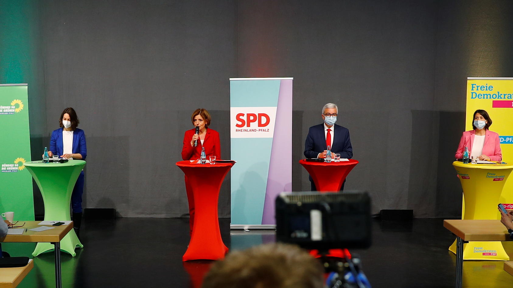 State Prime Minister Malu Dreyer of the Social Democratic Party (SPD) speaks next to Roger Lewentz of the Social Democratic Party (SPD), Volker Wissing and Daniele Schmitt of the Free Democratic Party's (FDP)  and Alliance 90/The Greens party leaders
