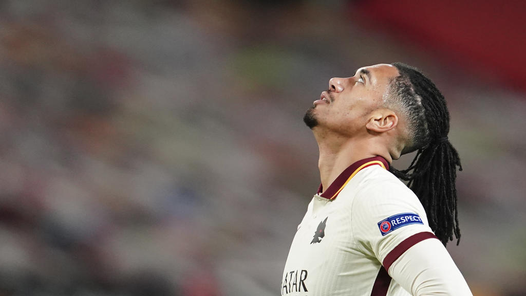 Roma's Chris Smalling reacts at the end of the Europa League semi final, first leg soccer match between Manchester United and Roma at Old Trafford in Manchester, England, Thursday, April 29, 2021. (AP Photo/Jon Super)