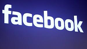 The Facebook logo is seen at the company headquarters in Palo Alto, California in this May 26, 2010 file photo. The social networking site has gone from nowhere a few years ago to become the biggest single seller of online display advertising in the U.S. with more than $2 billion in revenues this year, according news reports on July 1, 2011, quoting research firm eMarketer. REUTERS/Robert Galbraith/Files  (UNITED STATES - Tags: SCI TECH BUSINESS)