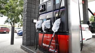 Gas pumps are covered with plastic bags at the Race Trac gas station, after a cyberattack crippled the biggest fuel pipeline in the country, run by Colonial Pipeline, in St. Petersburg, Florida, U.S., May 12, 2021. REUTERS/Octavio Jones