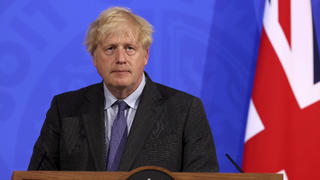 Britain's Prime Minister Boris Johnson attends a media briefing in Downing Street, London, Monday, June 14, 2021. Johnson has confirmed that the next planned relaxation of coronavirus restrictions in England will be delayed by four weeks until July 19 as a result of the spread of the delta variant. In a press briefing Monday, Johnson said he is â€œconfident that we wonâ€™t need more than four weeksâ€ as millions more people get fully vaccinated against the virus, which could save thousands of lives. (Jonathan Buckmaster/Pool Photo via AP)