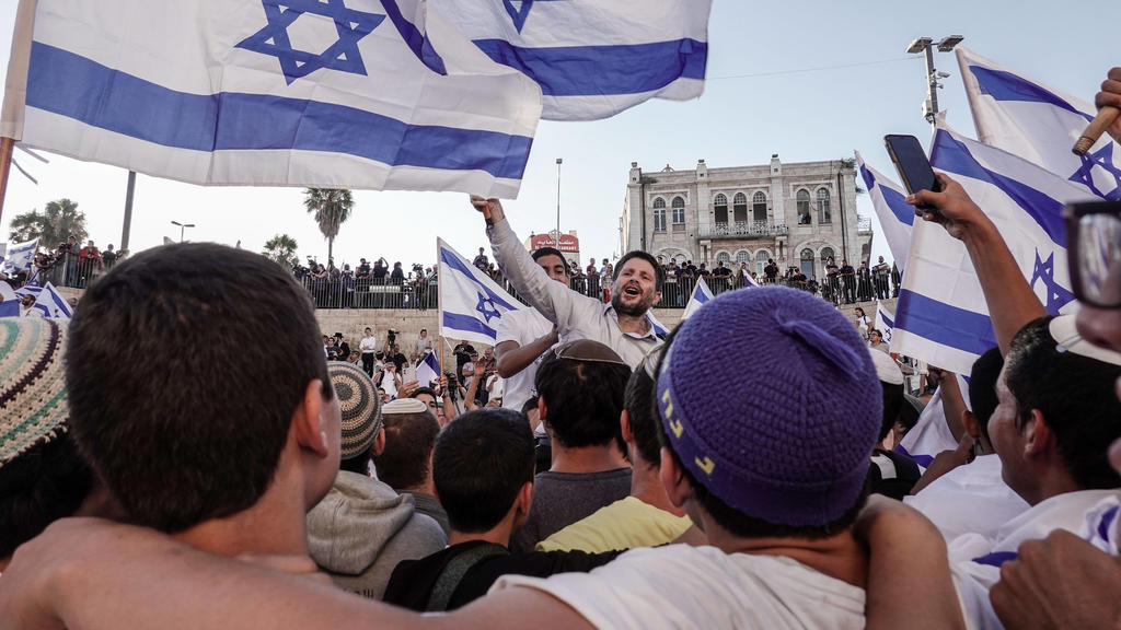 June 15, 2021, Jerusalem, Israel: Parliament Member BEZALEL SMICH of the Religious Zionism Party joins thousands identifying with the nationaloist religious Zionist streams marching in the annual Dance of Flags March from downtown Jerusalem to the D