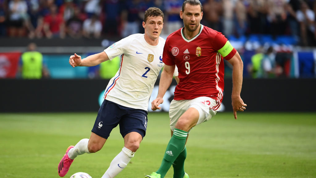 Soccer Football - Euro 2020 - Group F - Hungary v France - Puskas Arena, Budapest, Hungary - June 19, 2021 Hungary's Adam Szalai in action with France's Benjamin Pavard Pool via REUTERS/Franck Fife