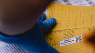  Mass Drive In Vaccination In Meerbusch a stafff records a vaccination with Johnson & Johnson vaccine on a vaccination card during mass drive in vaccination in Meerbusch, near Duesseldorf, Germany on June 5, 2021 as one day 3000 vaccination action with Johnson & Johnson is held from all the helps from local doctors Meerbusch Germany tang-notitle210605_npaRM PUBLICATIONxNOTxINxFRA Copyright: xYingxTangx