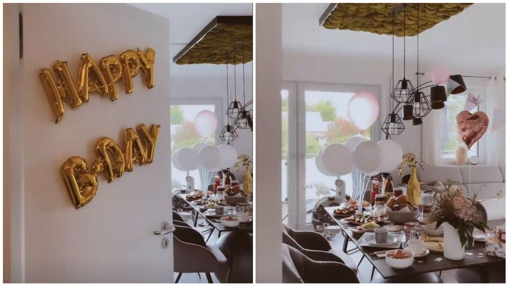 Sarah ist total baff, als sie ihr feierlich geschmücktes Wohnzimmer vorfindet.