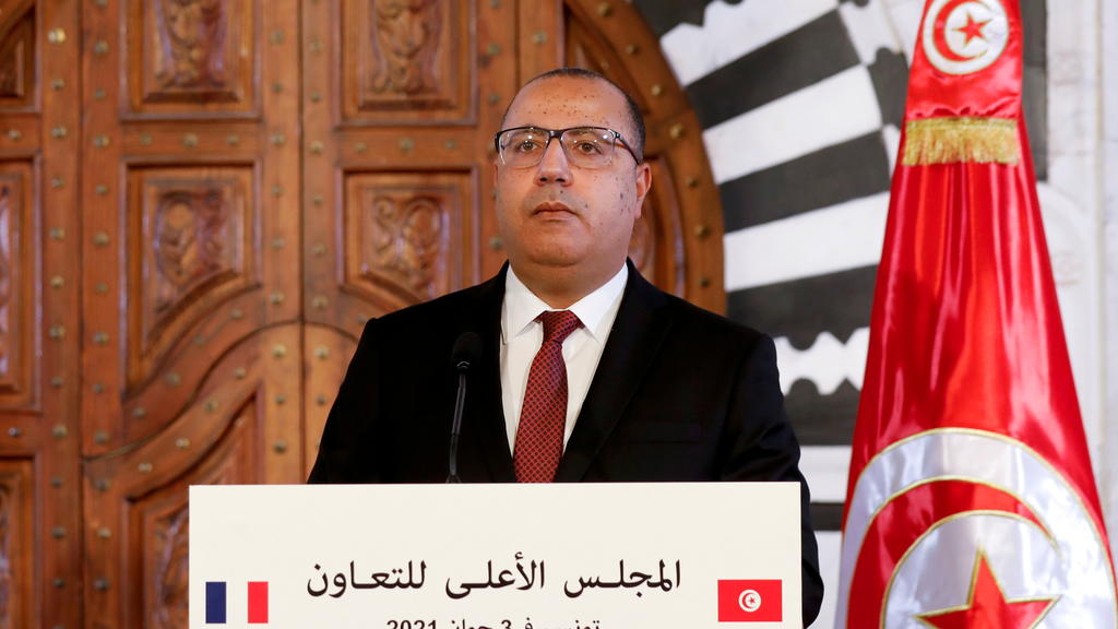 FILE PHOTO: Tunisian Prime Minister Hichem Mechichi appears in a news conference in Tunis, Tunisia, on June 3, 2021. REUTERS/Zoubeir Souissi/File Photo