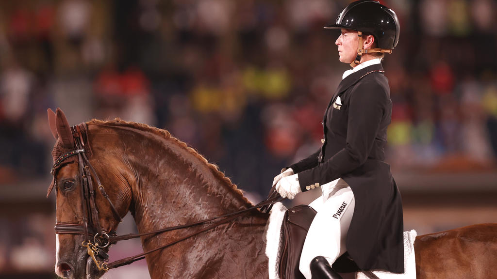 TOKYO, JAPAN - JULY 27: Isabell Werth of Team Germany riding Bella Rose 2 competes in the Dressage Team Grand Prix Special Team Final on day four of the Tokyo 2020 Olympic Games at Equestrian Park on July 27, 2021 in Tokyo, Japan. (Photo by Julian Fi