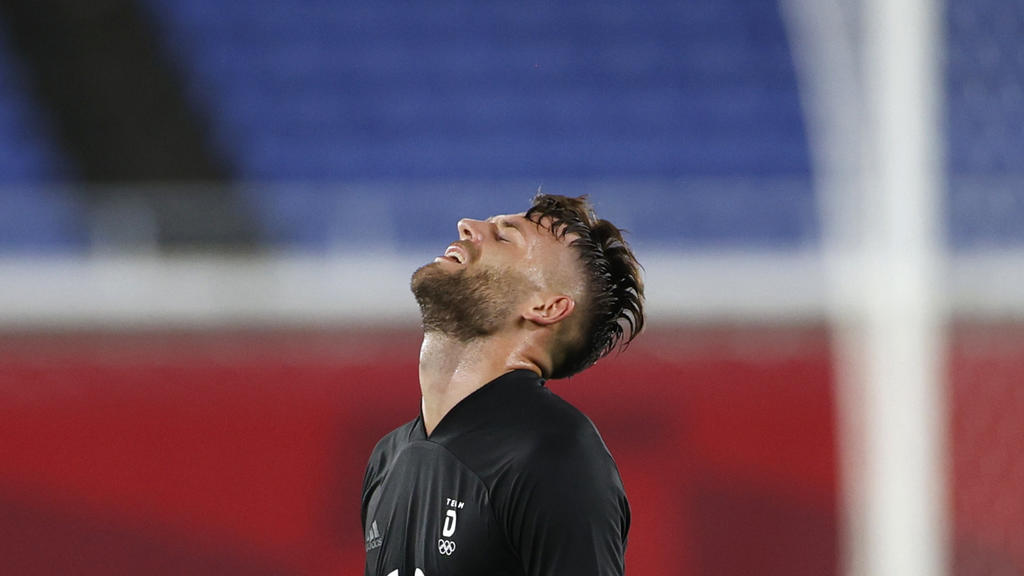 Tokyo 2020 Olympics - Soccer Football - Men - Group D - Saudi Arabia v Germany - International Stadium Yokohama, Yokohama, Japan - July 25, 2021. Eduard Loewen of Germany reacts at the end of the match REUTERS/Phil Noble