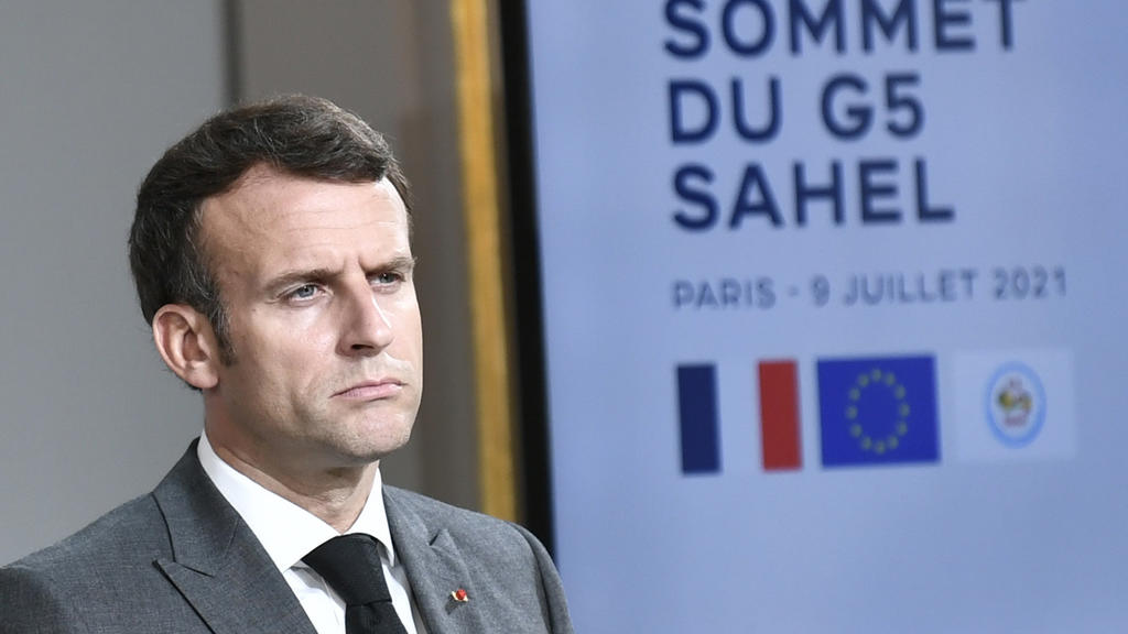 French President Emmanuel Macron attends a press conference after a video summit with leaders of G5 Sahel countries at the Elysee presidential Palace in Paris, Friday July 9, 2021. French President Emmanuel Macron said Friday his country will withdra