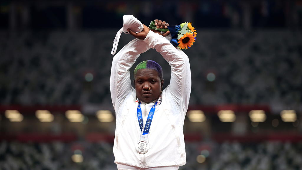 Tokyo 2020 Olympics - Athletics - Women's Shot Put - Medal Ceremony - Olympic Stadium, Tokyo, Japan – August 1, 2021. Silver medallist, Raven Saunders of the United States gestures on the podium REUTERS/Hannah Mckay TPX IMAGES OF THE DAY