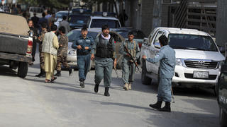 Afghan security personnel arrives at the area where the director of Afghanistan's Government Information Media Center Dawa Khan Menapal was shot dead in Kabul, Afghanistan, Friday, Aug. 6, 2021. The Taliban shot and killed the director of Afghanistan's Government Information Media Center on Friday, the latest killing of a government official and one that comes just days after an assassination attempt on the acting defense minister. (AP Photo/Rahmat Gul)