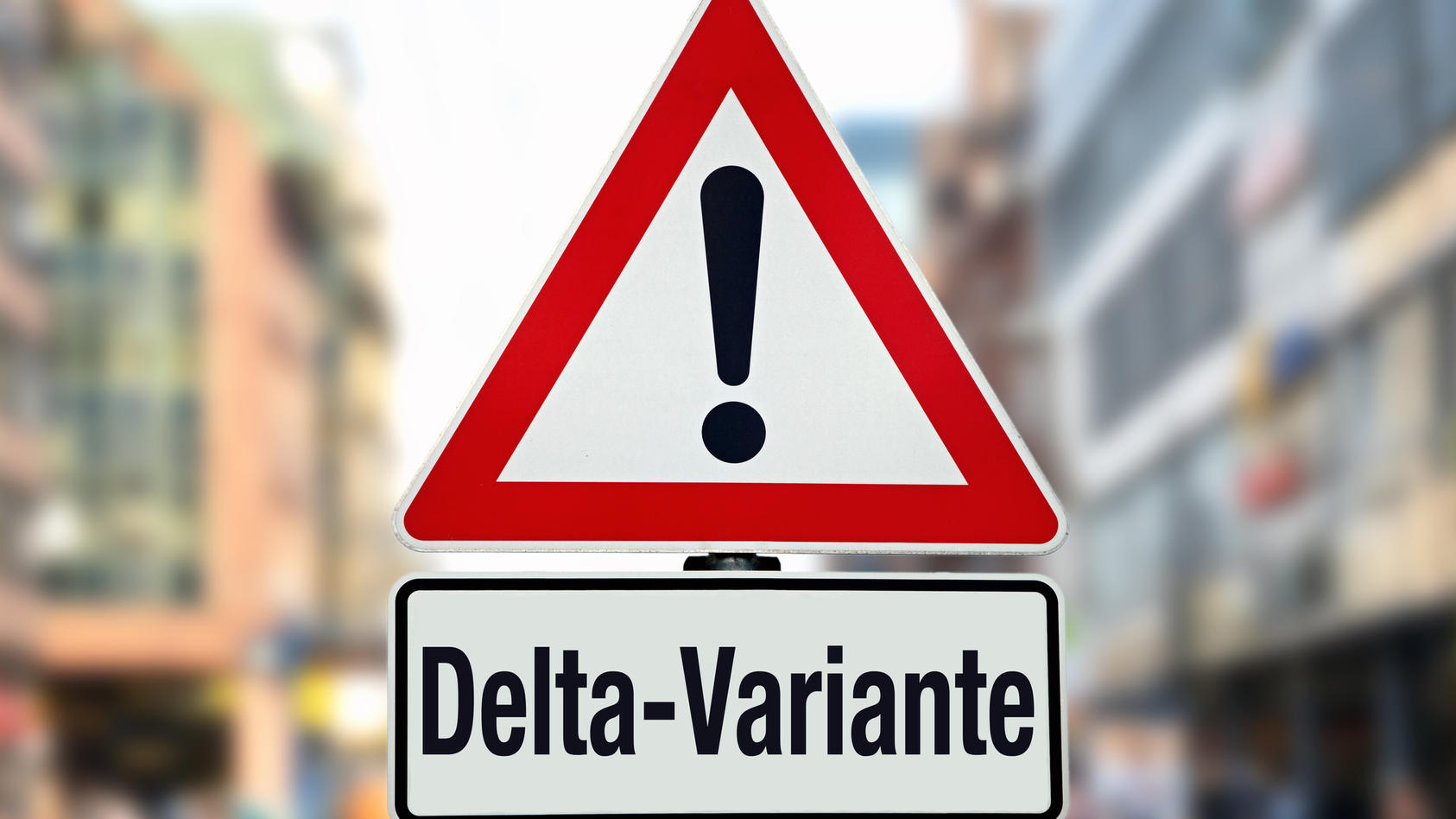Ein Hinweisschild mit der Aufschrift "Delta-Variante"