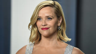 FILE - Reese Witherspoon arrives at the Vanity Fair Oscar Party in Beverly Hills, Calif., on Feb. 9, 2020. Witherspoon is selling Hello Sunshine, the media company she founded, to a newly formed company backed by private equity firm Blackstone Group. Terms of the transaction were not disclosed but The Wall Street Journal reported that the deal was worth about $900 million. (Photo by Evan Agostini/Invision/AP, File)