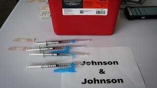 FILE PHOTO: Doses of Johnson & Johnson coronavirus disease (COVID-19) vaccines are seen in a mass vaccination site supported by the federal government at the Miami Dade College North Campus in Miami, Florida, U.S., March 10, 2021. REUTERS/Marco Bello/File Photo