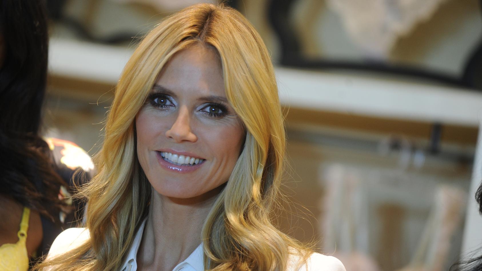 Heidi Klum greets her fans for the launch of her first lingerie collection, Heidi Klum Intimates at Bloomingdale's 59th Street store on March 13, 2015 in New York City.