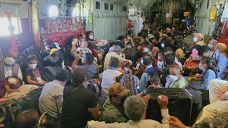  August 25, 2021, Kabul, Afghanistan: Afghan co-workers and their families board a C-130J plane of the South Korean Air Force at an airport in Kabul during an evacuation operation to bring to the South a total of 391 Afghans from the war-torn country. Afghan arrived in South Korea on Thursday as part of Seoul s efforts to evacuate local co-workers of the country s embassy and other facilities in the war-torn nation after the Taliban s seizure of power. Kabul Afghanistan - ZUMAs168 20210825_zih_s168_001 Copyright: xSouthxKoreanxDefensexMinistryx