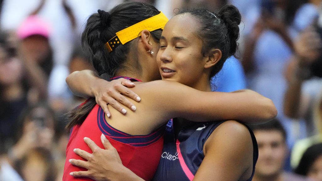 Sep 11, 2021; Flushing, NY, USA; Emma Raducanu of Great Britain (L) hugs Leylah Fernandez of Canada (R) after their match in the women's singles final on day thirteen of the 2021 U.S. Open tennis tournament at USTA Billie Jean King National Tennis Ce