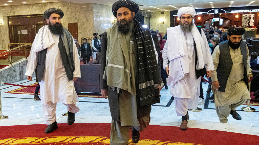 FILE PHOTO: Mullah Abdul Ghani Baradar, the Taliban's deputy leader and negotiator, and other delegation members attend the Afghan peace conference in Moscow, Russia March 18, 2021. Alexander Zemlianichenko/Pool via REUTERS/File Photo/File Photo