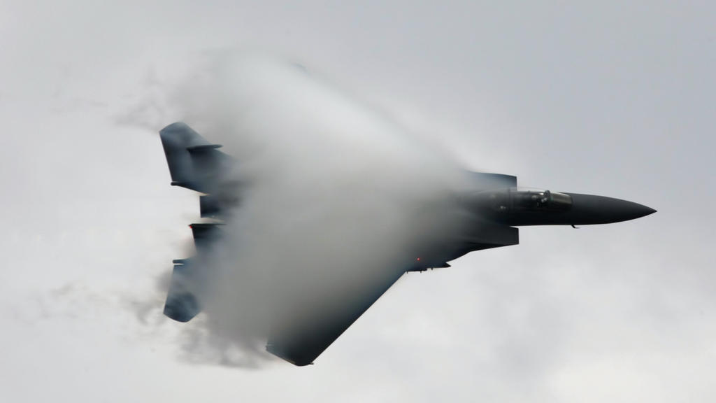 US Air Force F15 jet fighter breaks the sound barrier during a demonstration flight at the 2011 MAKS International Aerospace Show in Zhukovsky