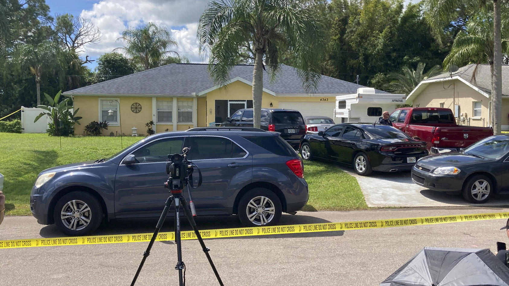 Law enforcement officials swarmed a home in North Port, Fla. on Monday, Sept. 20, 2021, in the disappearance of Gabby Petito, whose body was apparently discovered over the weekend at a Wyoming national park. The officers served a search warrant at th