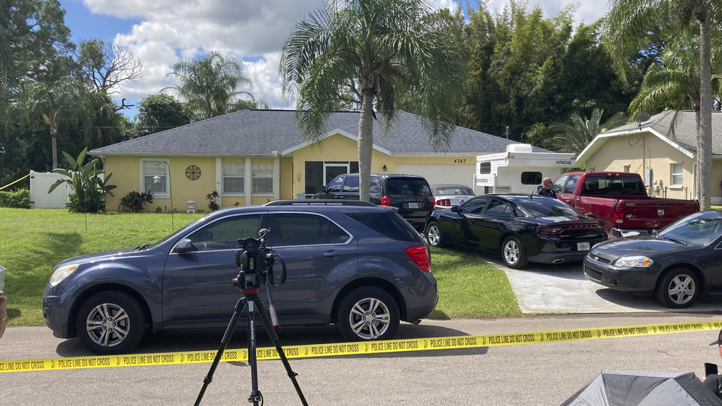 Police tape blocks off the home of Brian Laundrieâ€™s parents in North Port, Fla., Monday, Sept. 20, 2021. Laundrie, 23, was traveling on a cross-country road trip with Gabby Petito, 22, who went missing in August. Petitoâ€™s body was apparently disc