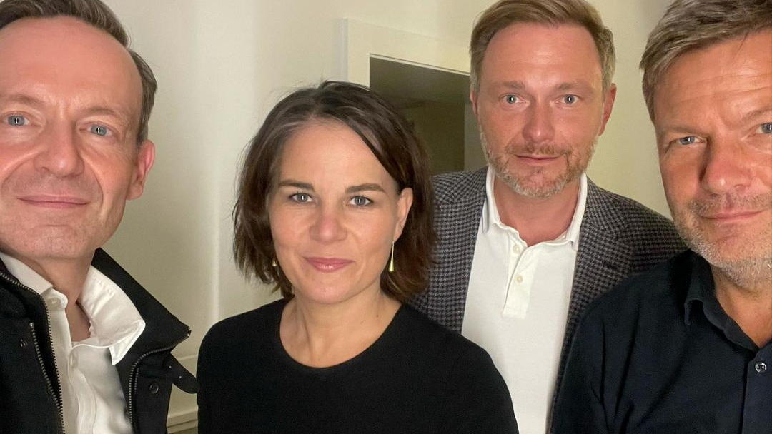 German politicians Volker Wissing and Christian Lindner of the FDP, together with Annalena Baerbock and Robert Habeck of the Greens, pose for a selfie photograph, in an unknown location September 28, 2021 in this picture obtained from social media.  