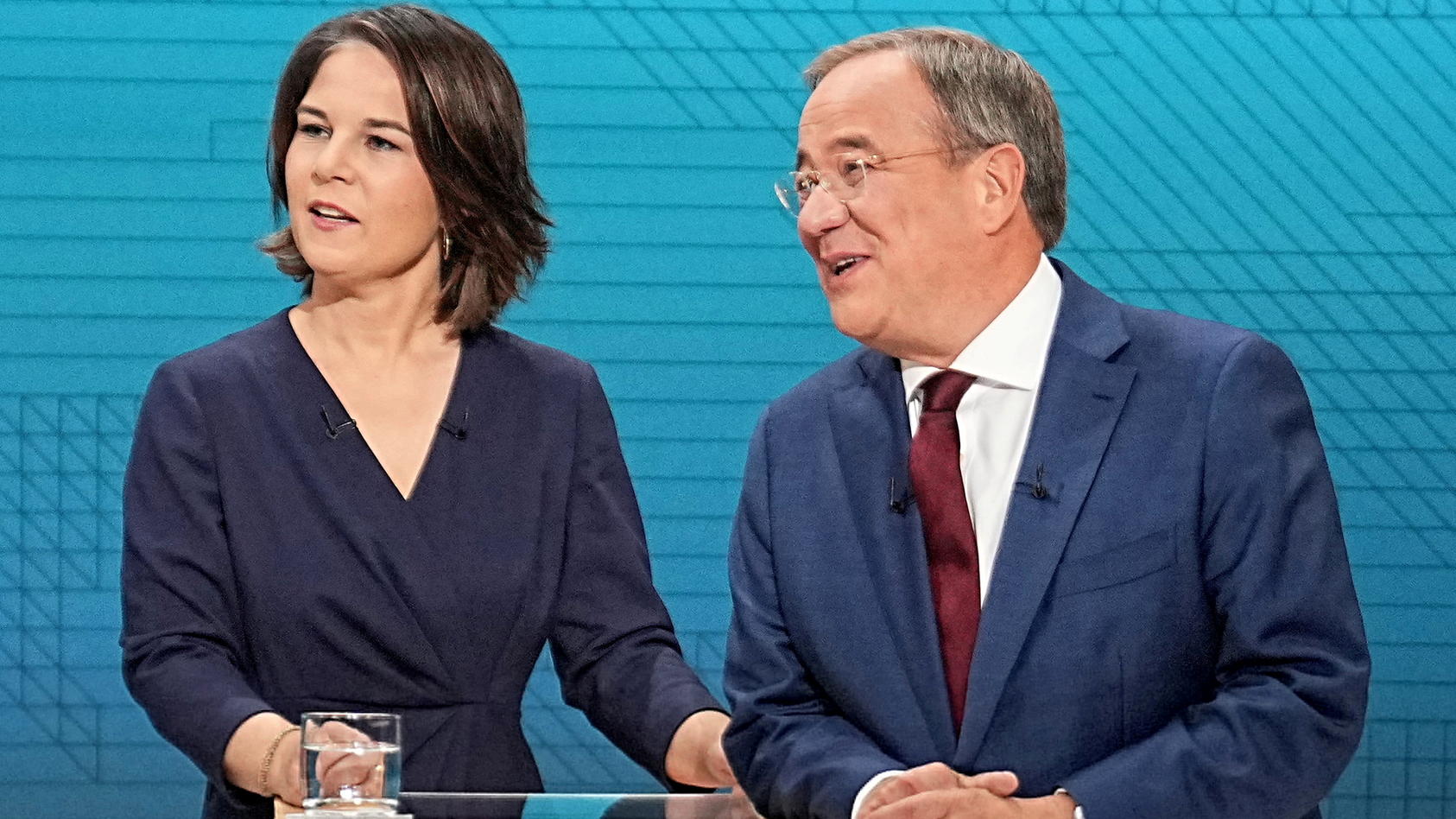 FILE PHOTO: Chairwoman of Buendnis 90/Die Gruenen Annalena Baerbock, Prime Minister of North Rhine-Westphalia (NRW) and leader of the Christian Democratic Union (CDU) Armin Laschet and German Finance Minister and Social Democratic Party candidate Ola