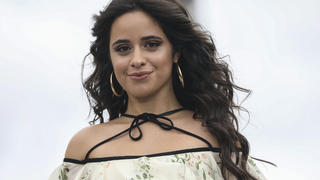 Camila Cabello wears a creation for the L'Oreal Spring-Summer 2022 ready-to-wear fashion show presented in Paris, Sunday, Oct. 3, 2021. (Photo by Vianney Le Caer/Invision/AP)
